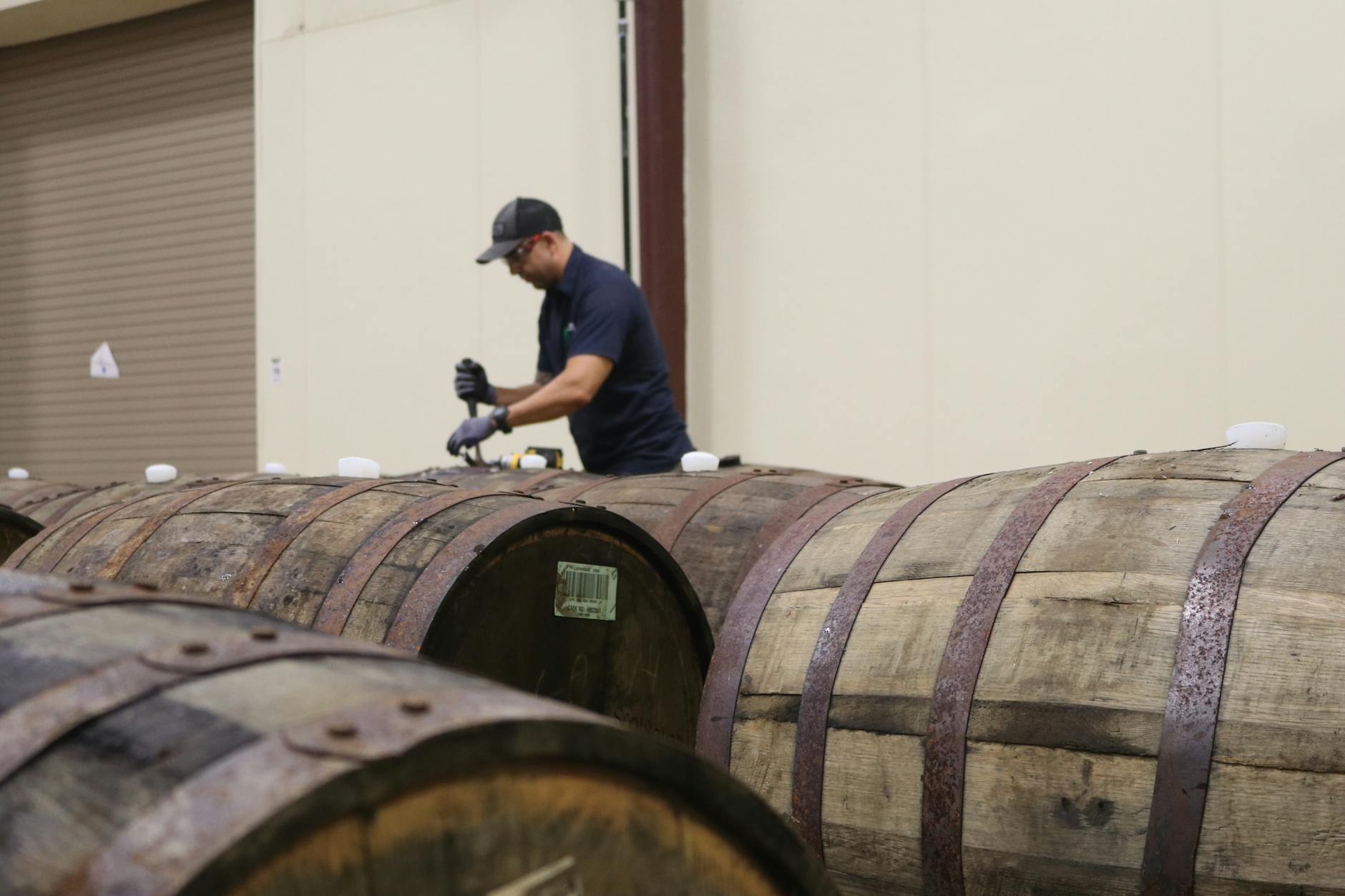 man fixing barrel